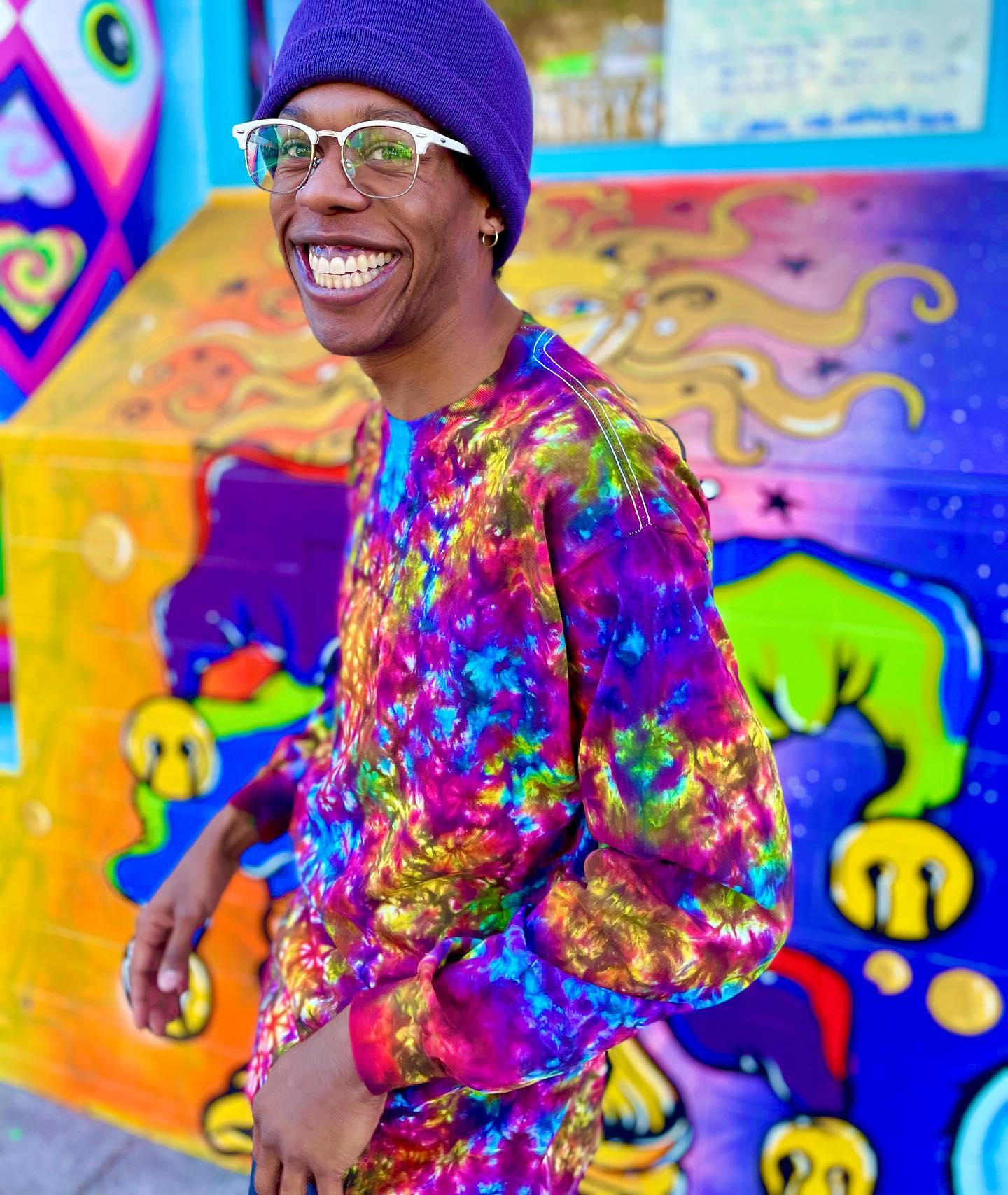 Man in tie dye t-shirt